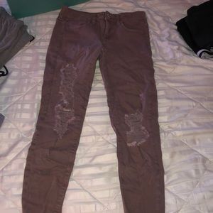 American Eagle pink ripped skinny jeans